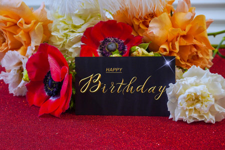 postcard , Internet banner with a birthday greeting, with the inscription - happy birthday, a bouquet of flowers with a note of congratulationsの写真素材