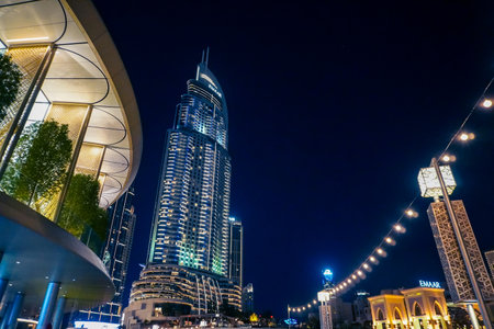 Dudai, UAE - March,18,2023: Dubai streets, houses and skyscrapers, view at night , Burj Khalifa