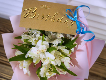 postcard , Internet banner with a birthday greeting, with the inscription - happy birthday, bouquet of flowersの写真素材