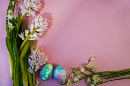 happy easter! Flat Lay, postcard or Internet banner with Copy Space on Easter, Bouquet of flowers and Easter eggsの写真素材