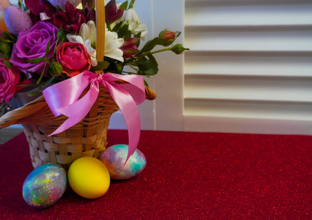 happy easter! Flat Lay, postcard or Internet banner with Copy Space on Easter, Bouquet of flowers and Easter eggsの写真素材