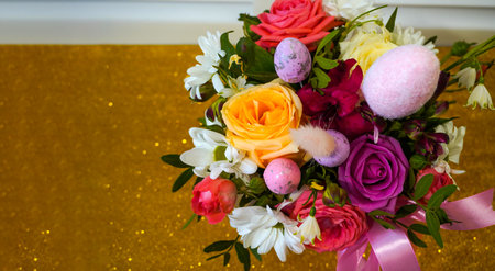 Happy Easter! Flat Lay, postcard or Internet banner with Copy Space on Easter. Bouquet of flowers and Easter eggsの写真素材