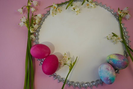 happy easter! Flat Lay, postcard or Internet banner with Copy Space on Easter. snowdrop flowers and easter eggsの写真素材