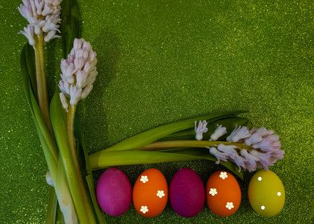 Happy Easter! Flat Lay, postcard or Internet banner with Copy Space on Easter, Bouquet of flowers and Easter eggsの写真素材