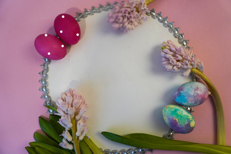 Happy Easter! Flat Lay, postcard or Internet banner with Copy Space on Easter, Bouquet of flowers and Easter eggsの写真素材