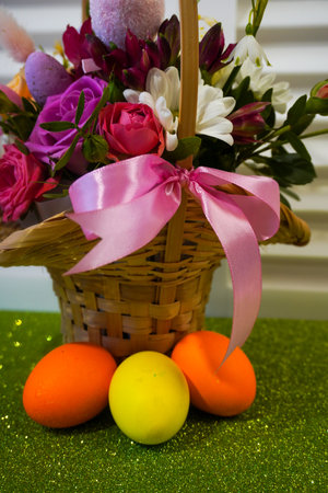 Happy Easter! Flat Lay, Internet banner, postcard on Easter. Bouquet of flowers and Easter eggsの写真素材