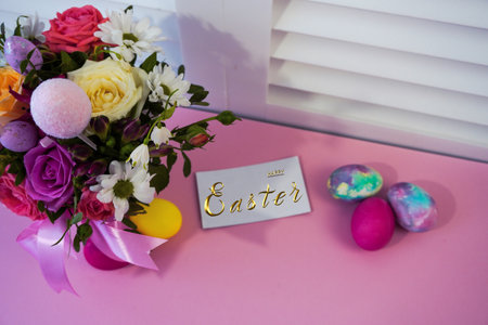 Happy Easter! Flat Lay, Internet banner, postcard on Easter. Bouquet of flowers and Easter eggsの写真素材