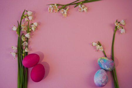 happy easter! Flat Lay, postcard or Internet banner with Copy Space on Easter. snowdrop flowers and easter eggsの写真素材