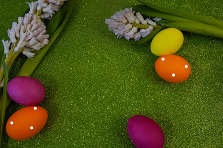 Happy Easter! Flat Lay, postcard or Internet banner with Copy Space on Easter, Bouquet of flowers and Easter eggsの写真素材