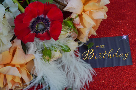 postcard , Internet banner with a birthday greeting, with the inscription - happy birthday, a bouquet of flowers with a note of congratulationsの写真素材