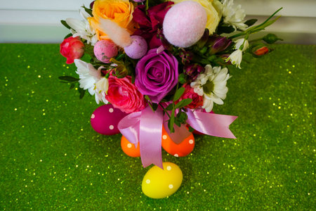 Happy Easter! Flat Lay, Internet banner, postcard on Easter. Bouquet of flowers and Easter eggsの写真素材
