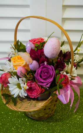 Happy Easter! Flat Lay, Internet banner, postcard on Easter. Bouquet of flowers and Easter eggsの写真素材