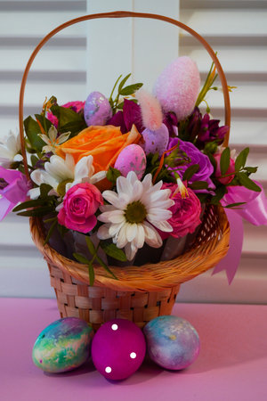 Happy Easter! Flat Lay, Internet banner, postcard on Easter. Bouquet of flowers and Easter eggsの写真素材