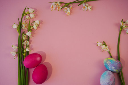 happy easter! Flat Lay, postcard or Internet banner with Copy Space on Easter. snowdrop flowers and easter eggsの写真素材
