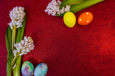 Happy Easter! Flat Lay, postcard or Internet banner with Copy Space on Easter, Bouquet of flowers and Easter eggsの写真素材