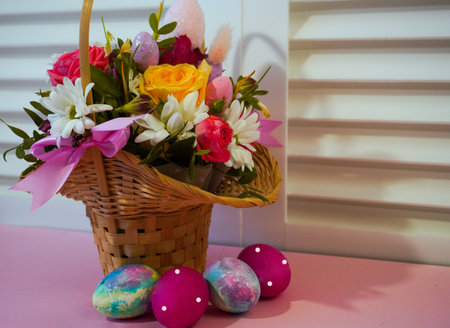 Happy Easter! Flat Lay, postcard or Internet banner with Copy Space on Easter, Bouquet of flowers and Easter eggsの写真素材