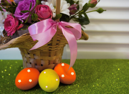 Happy Easter! Flat Lay, postcard or Internet banner with Copy Space on Easter, Bouquet of flowers and Easter eggsの写真素材