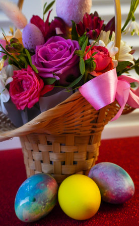 Happy Easter! Flat Lay, Internet banner, postcard on Easter. Bouquet of flowers and Easter eggsの写真素材