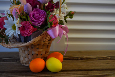 Happy Easter! Flat Lay, postcard or Internet banner with Copy Space on Easter, Bouquet of flowers and Easter eggsの写真素材