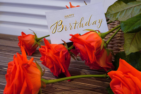 postcard , Internet banner with a birthday greeting, with the inscription - happy birthday, a bouquet of flowers with a note of congratulations, rosesの写真素材