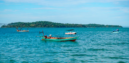 Sihanoukville, Cambodia -December 25, 2023: ships at sea in Sihanoukville in Cambodiaの写真素材