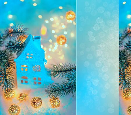 Greeting card Happy New Year and Merry Christmas. Beautiful cottage or chalet and blurred background of winter decoration for the holiday. Toned image, soft focus, closeup. Mockup, copy space.の写真素材