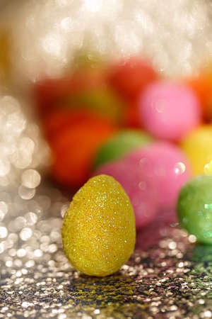 Blurred background with Easter eggs and bokeh. Close-up.The artistic intend and the filters. Film style.の写真素材