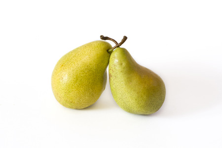 Fresh slice pear on white background isolated, yellow pears on a white background, Ripe pears on a white background closeupの写真素材
