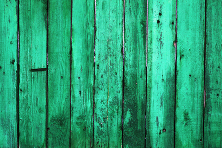 Dark green old wooden boards. Backgrounds and textures fence painted. Front view. Attract beautiful vintage background.の写真素材