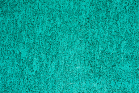 Texturized blue putty. Vintage or grungy background of venetian stucco texture as pattern wall. Texturized blue putty. Vintage or grungy background of stucco textureの写真素材