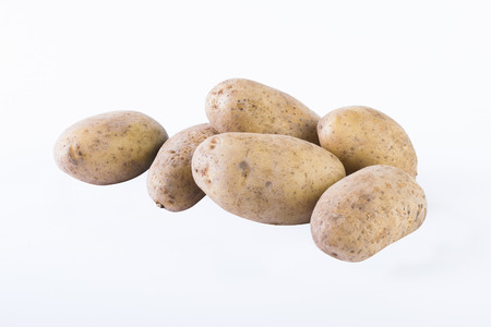 Potatoes on a white background. The  vegetable on a white background.の写真素材
