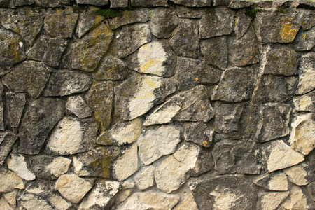 Stone Wall Background. Texture of large stones. Stone wall background close up. Stone wall texture.の写真素材