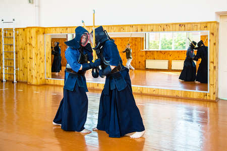 Close up of kendo fighter with shinai. Japanese martial art of sword fightingの写真素材