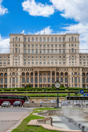 05/30/2025 Bucharest, Romania. Panoramic summer view Palace Parliament among green meadow. Splendid morning cityscape Bucharest city, Romania. Traveling concept background.の写真素材