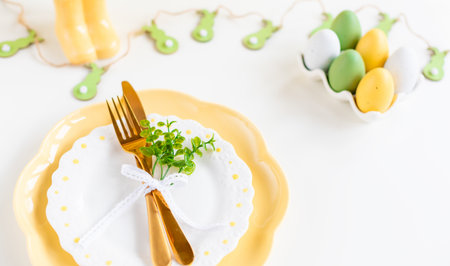 Happy Easter. Easter celebration concept. Top view vertical empty dishes Easter eggs, on isolated pastel background. Copy space, place for text, bannerの写真素材