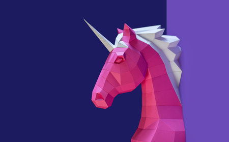 Geometric Pink blue Unicorn Sculpture Dual Background. Bold and modern geometric unicorn sculpture in pink white stands against split pink purple background, blending fantasy with minimalistic design.の写真素材