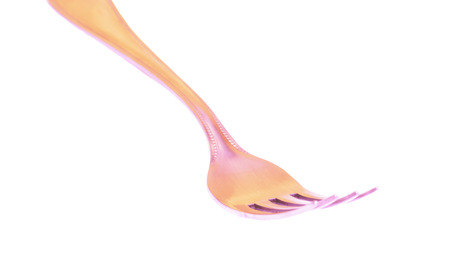 Silver fork on white background の写真素材