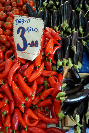 eggplants tomatoes peppers at the marketの写真素材