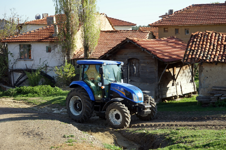 beautiful brand new blue rustic tractor