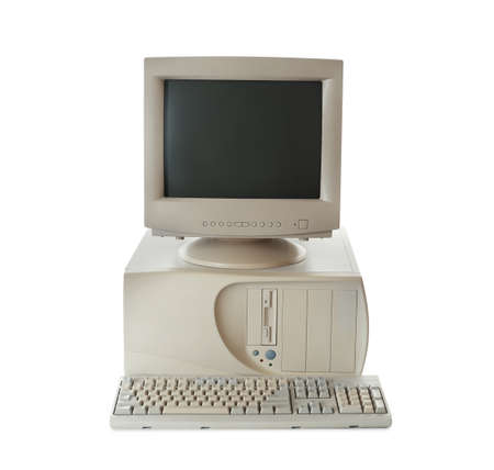 Old computer monitor, keyboard and system unit on white backgroundの写真素材
