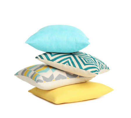 Different colorful decorative pillows on white backgroundの写真素材