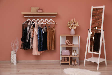 Collection of trendy women's garments in clothing rental salon