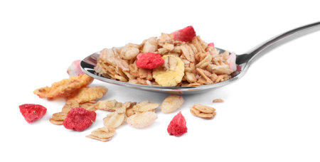 Spoon with granola on white background. Healthy snackの写真素材