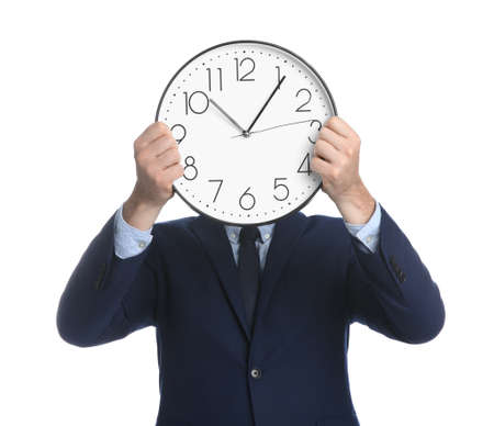 Businessman holding clock on white background. Time managementの写真素材