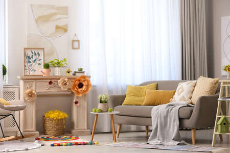 Decorative fireplace with modern furniture in living room. Interior designの写真素材