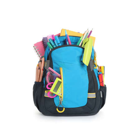 Color backpack with different school supplies isolated on whiteの写真素材