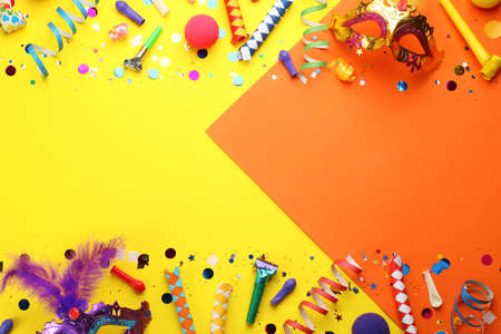 Flat lay composition with carnival items on color background. Space for textの写真素材