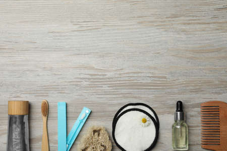 Flat lay composition with eco friendly products on wooden background, space for text. Conscious consumptionの写真素材
