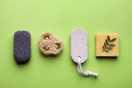 Flat lay composition with pumice stones on light green backgroundの写真素材