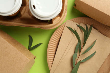 Flat lay composition with eco friendly products on light green backgroundの写真素材